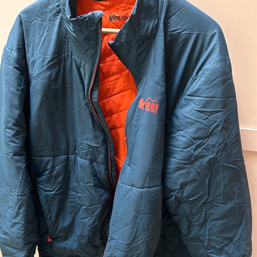 Blue and Orange REI Puffer Jacket with Stand-Up Collar